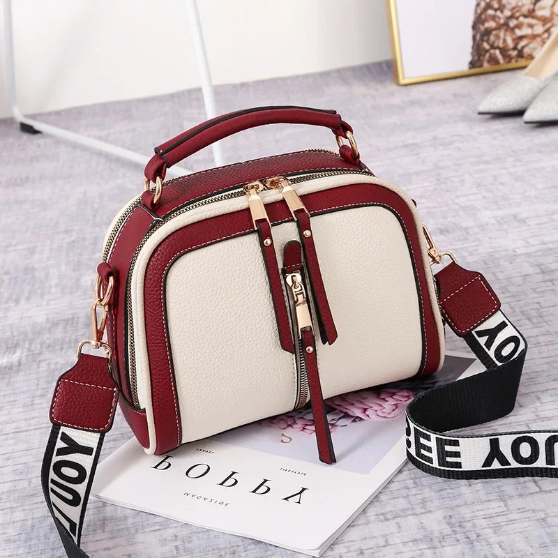 trendy handbag with wide strap