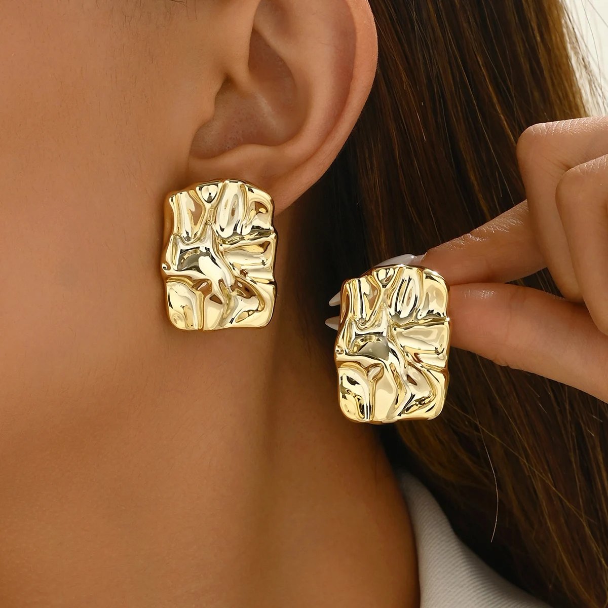 gold statement earrings